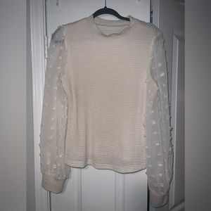 Long sleeve sweater top. Front is lined. Only worn once!
